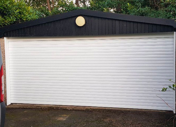 Photo of a white roller shutter garage door in Dorset.