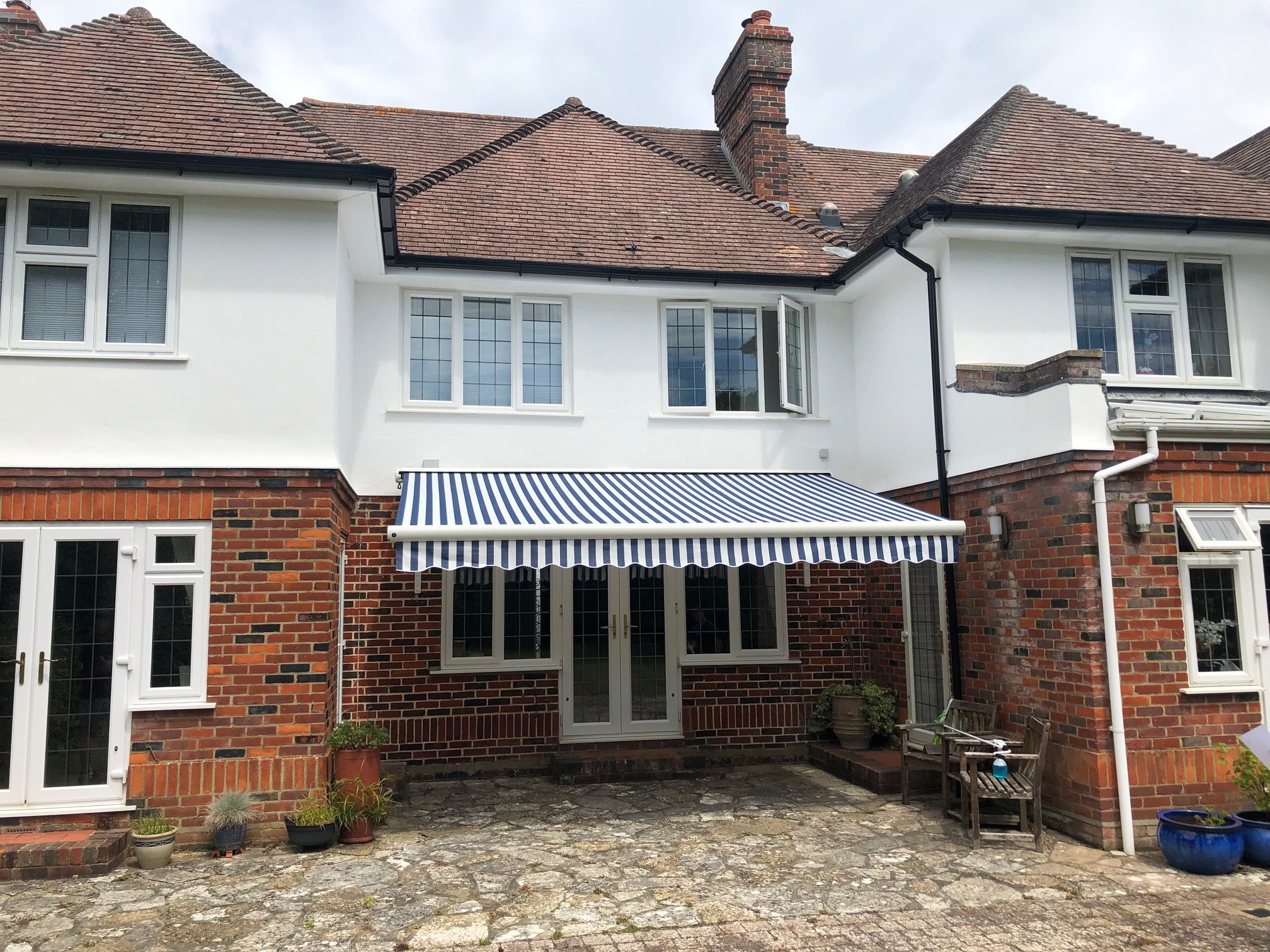 Photo of an awning installed on the front of a house in Chichester.